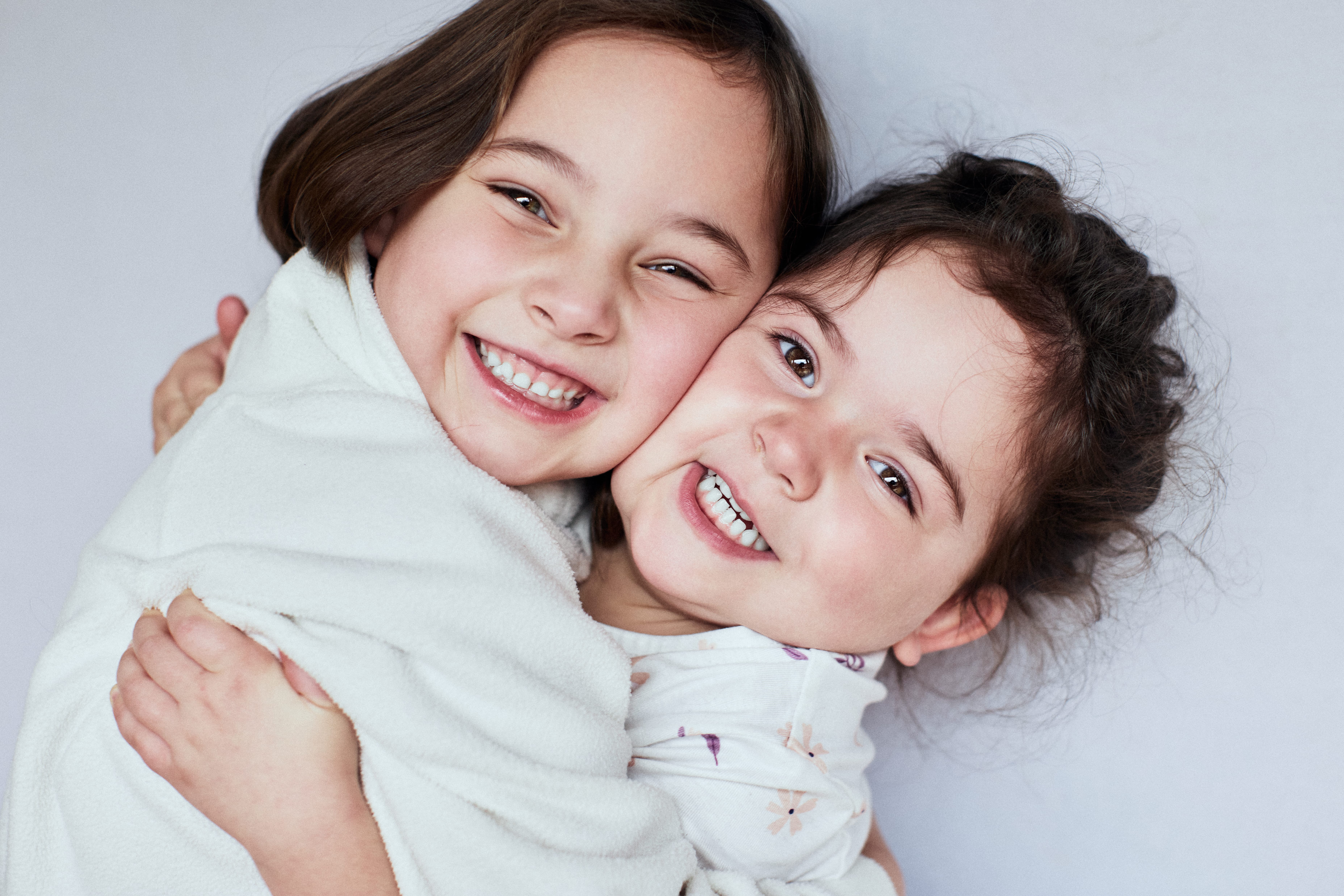 Portrait of a child with a playful expression.