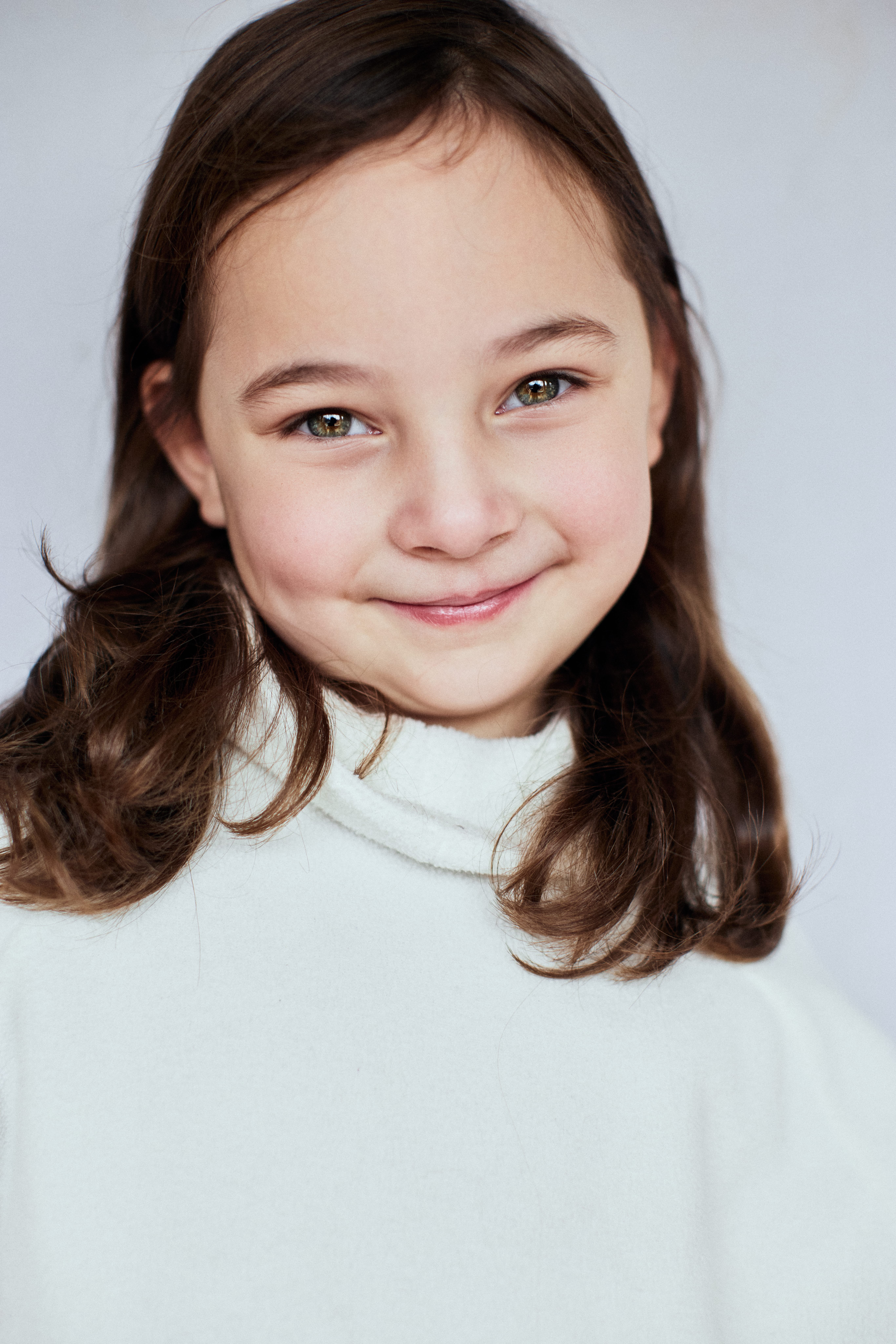 Young child looking at the camera.