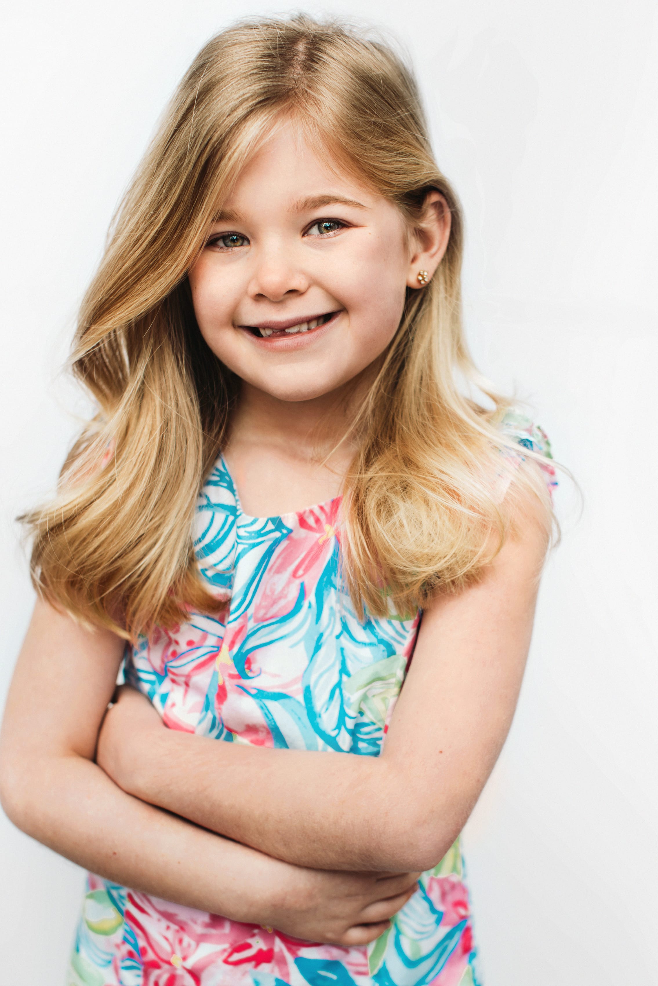 Portrait of a young child smiling.