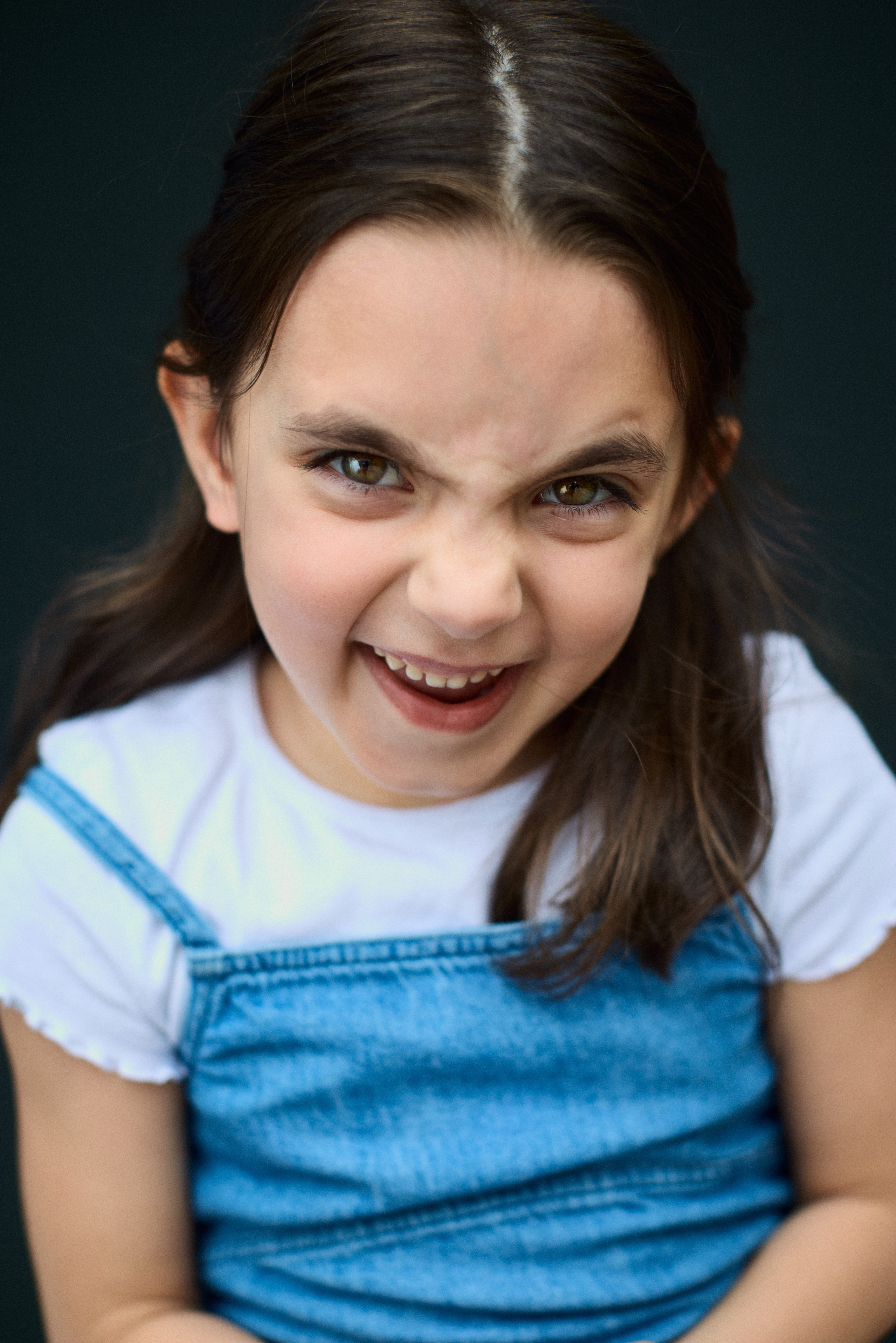 Young child posing for a portrait.