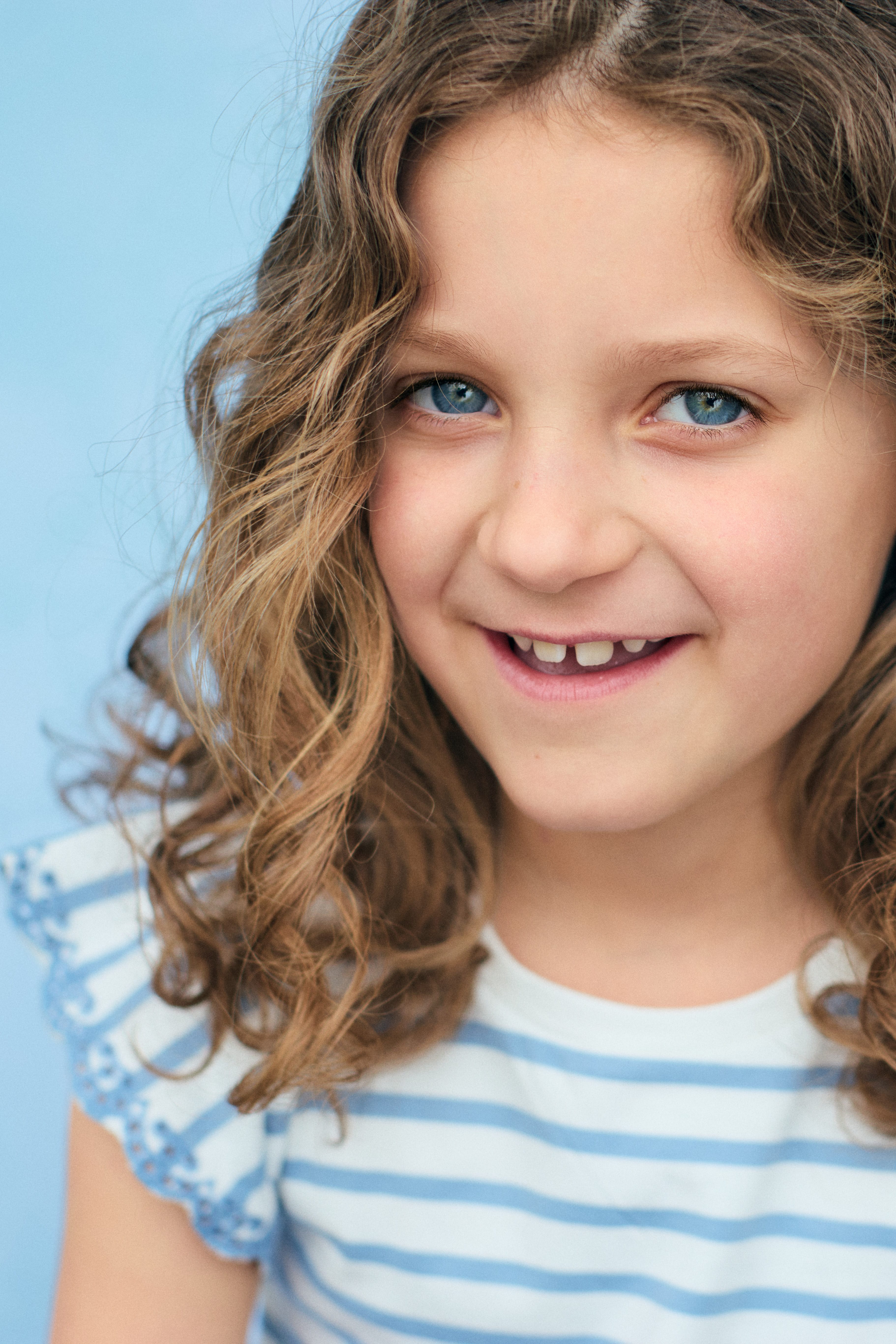 Child looking relaxed and happy.