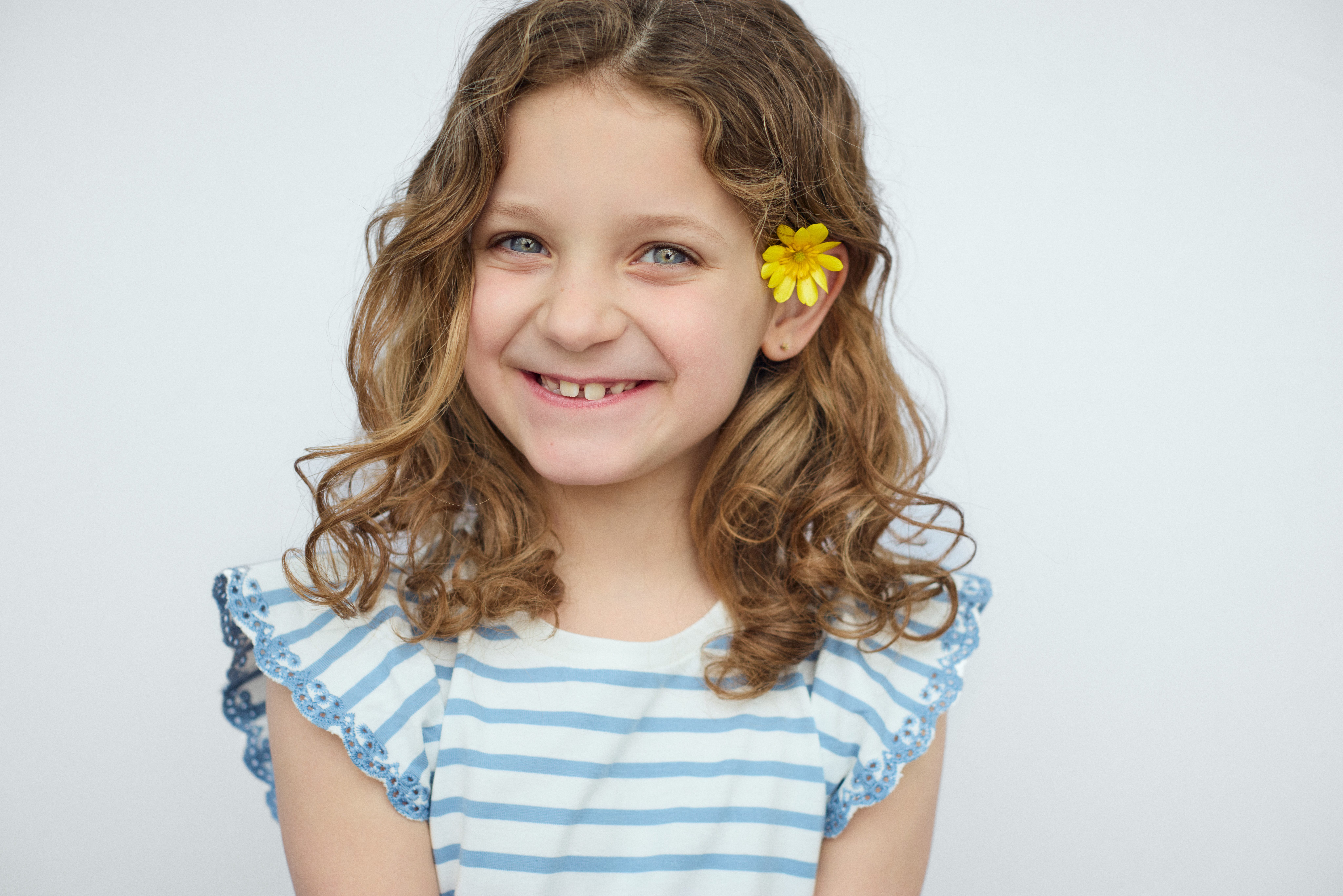 Portrait of a child with a bright expression.