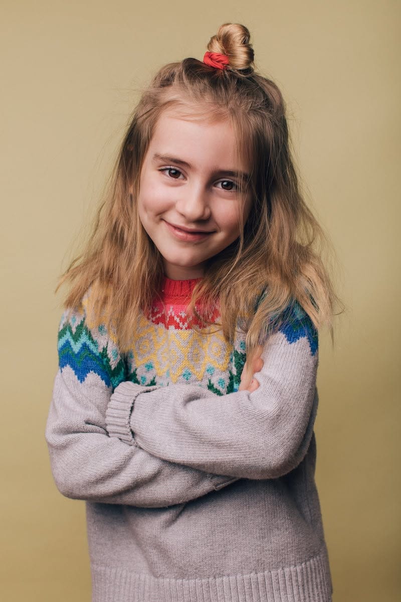 Portrait of a child with a cheerful smile.