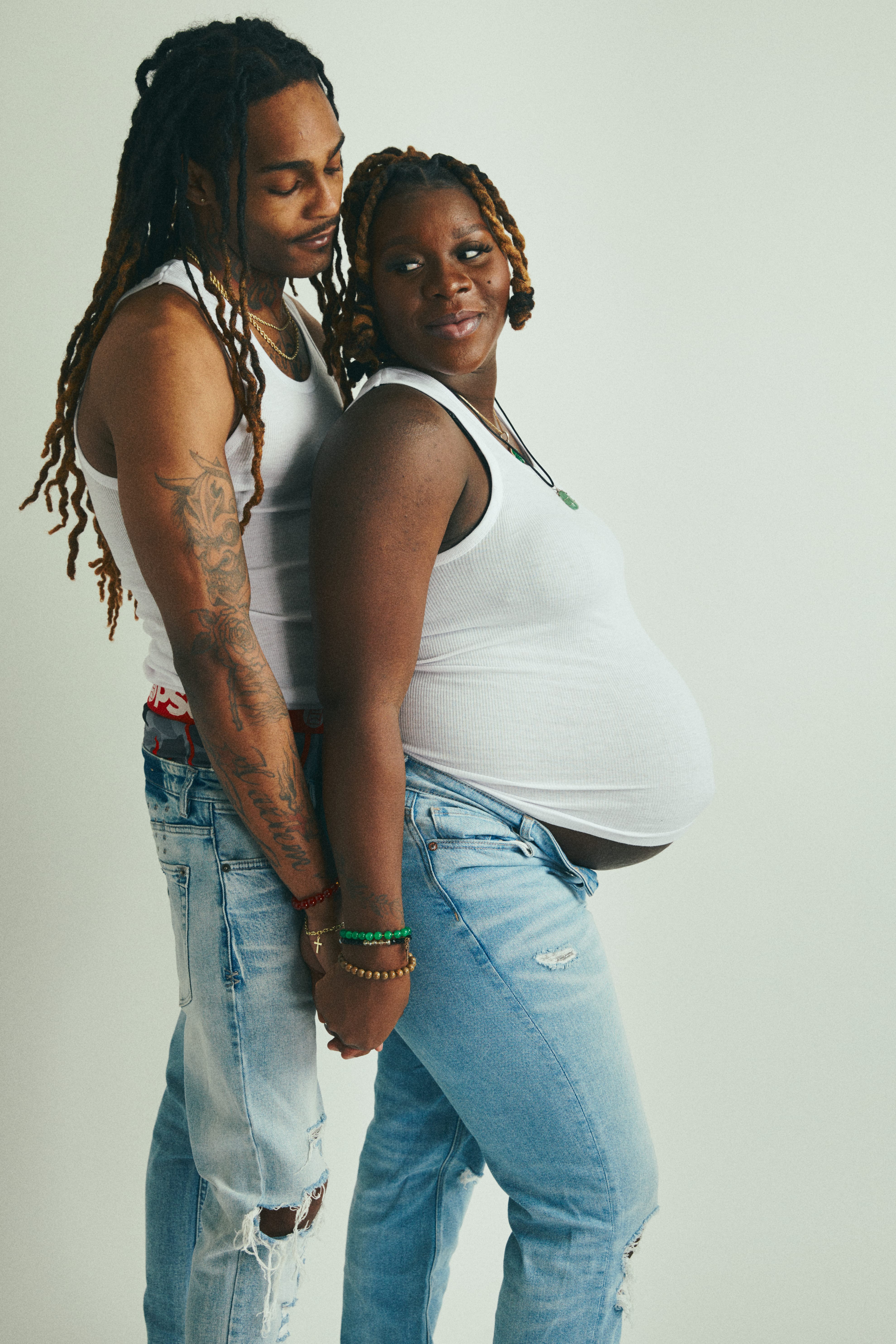 Expectant couple standing together