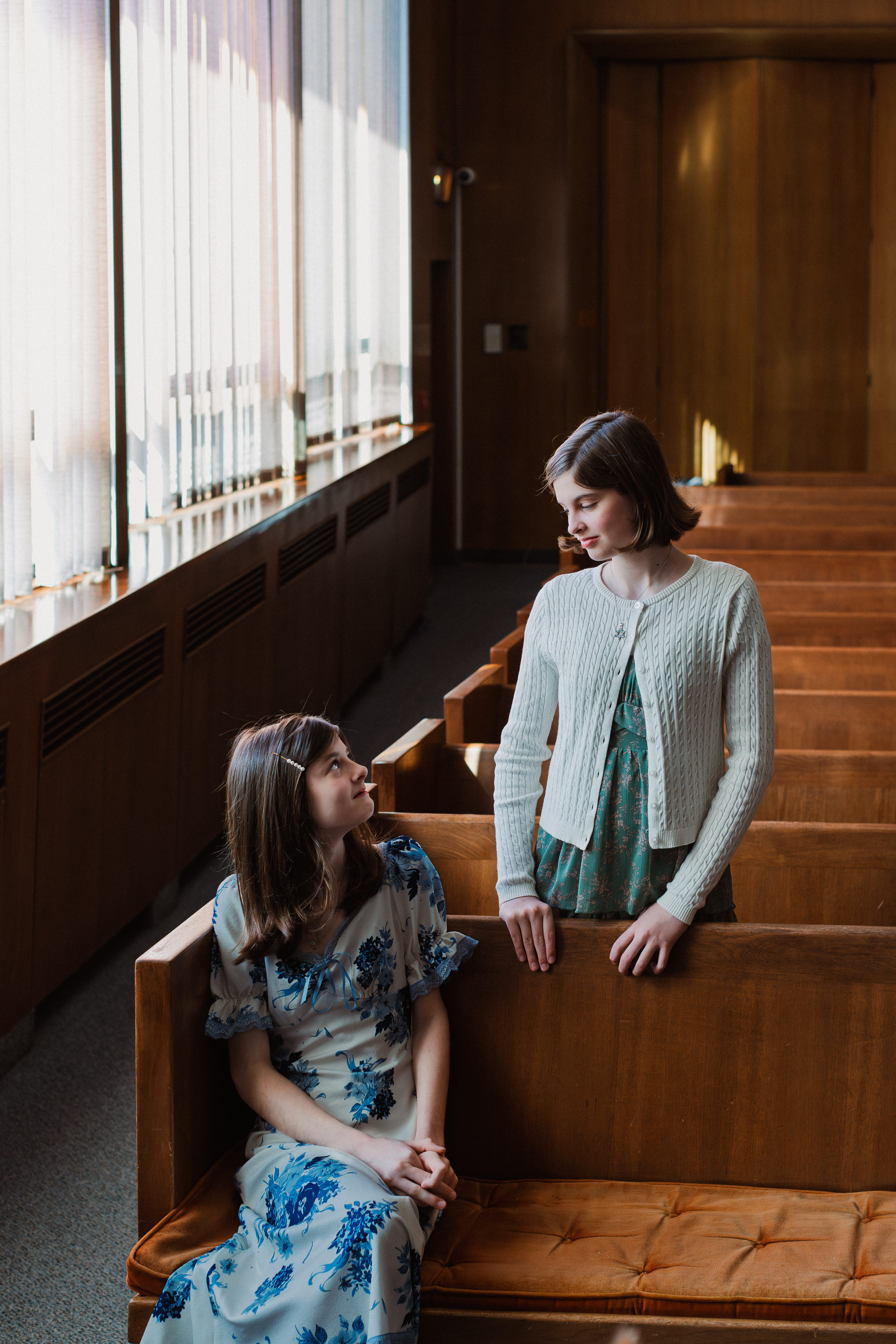 Young women seated in the synagogue before a Bat Mitzvah ceremony