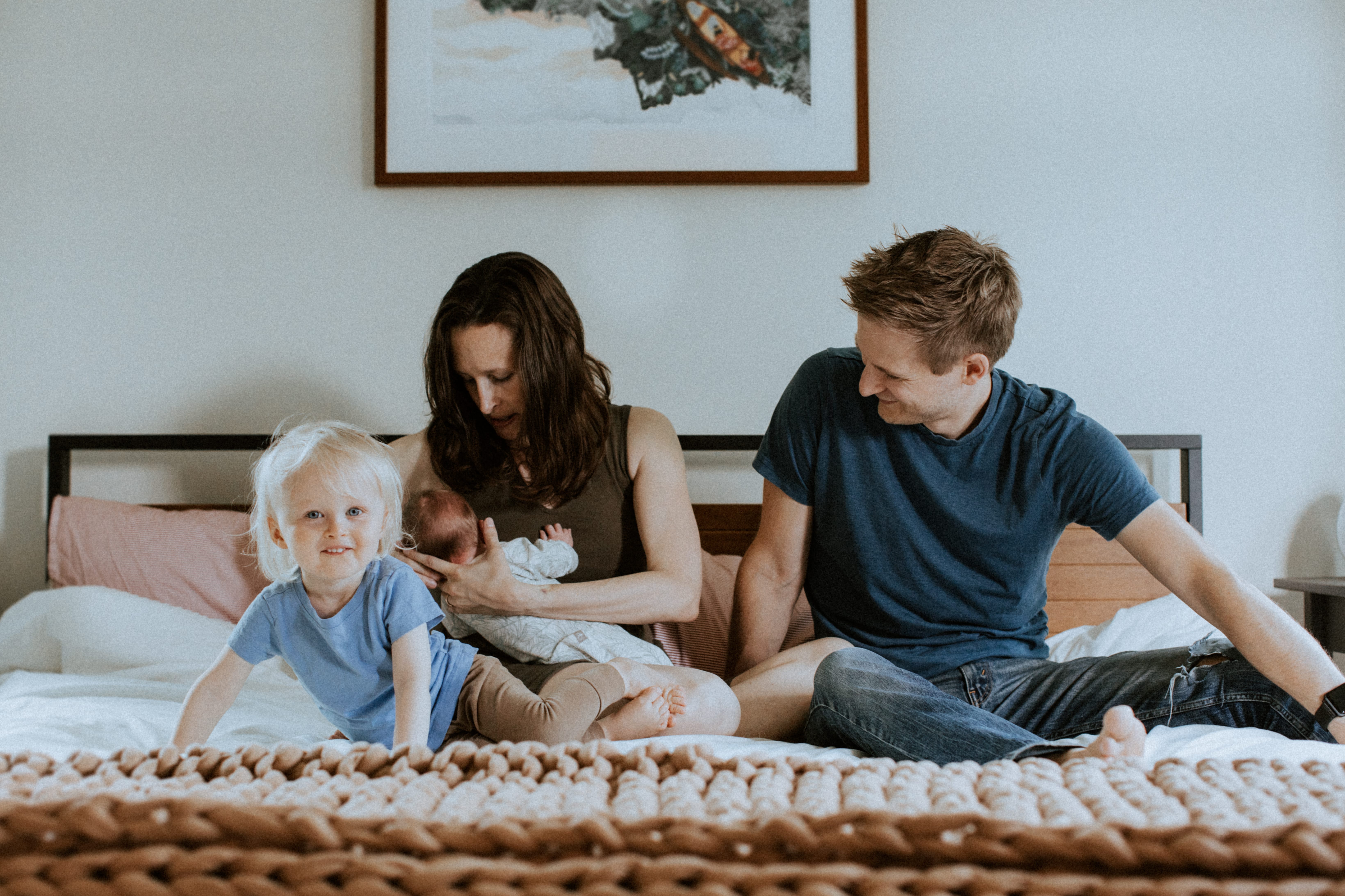 Newborn family portrait session featuring sibling