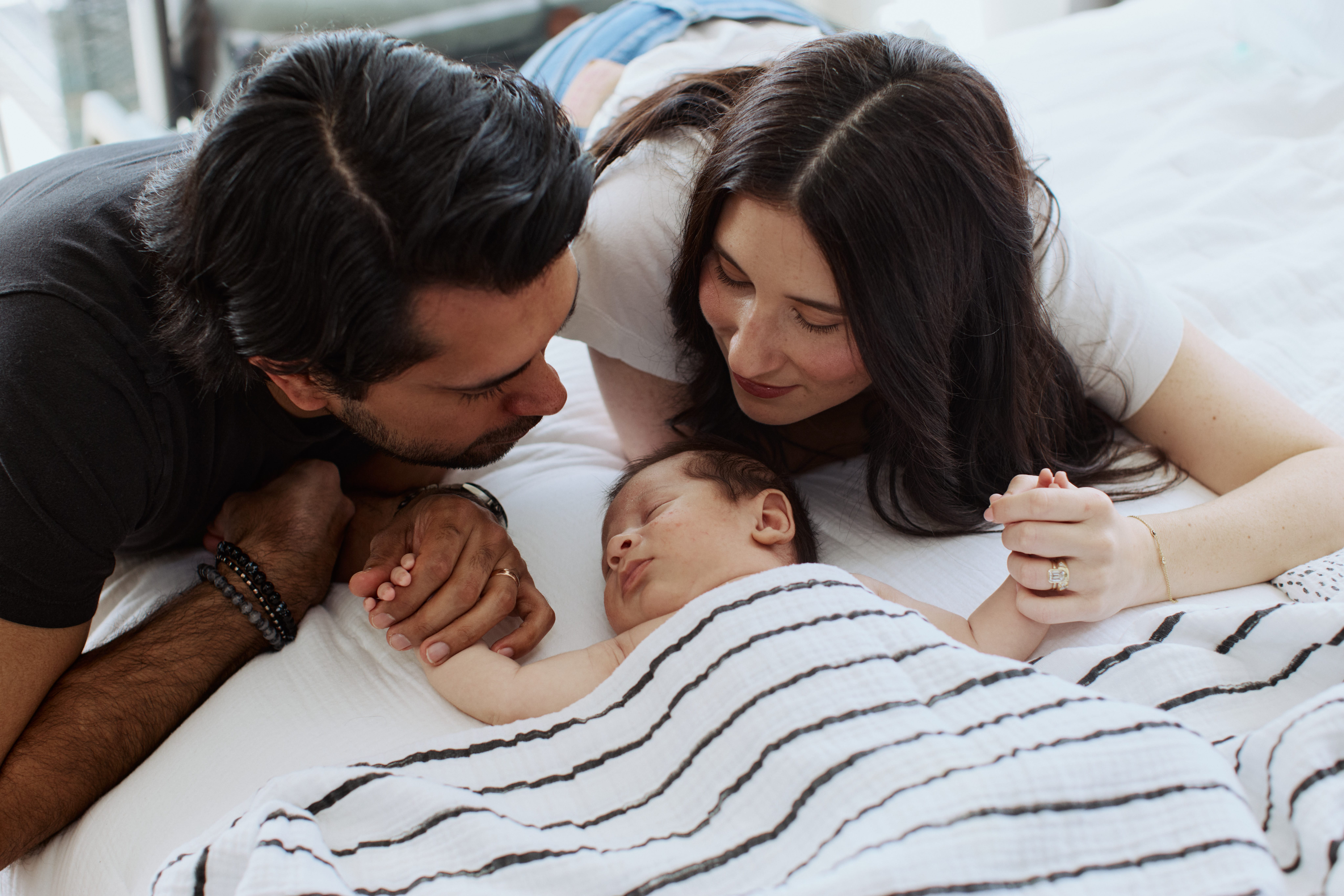 Mother and father with newborn