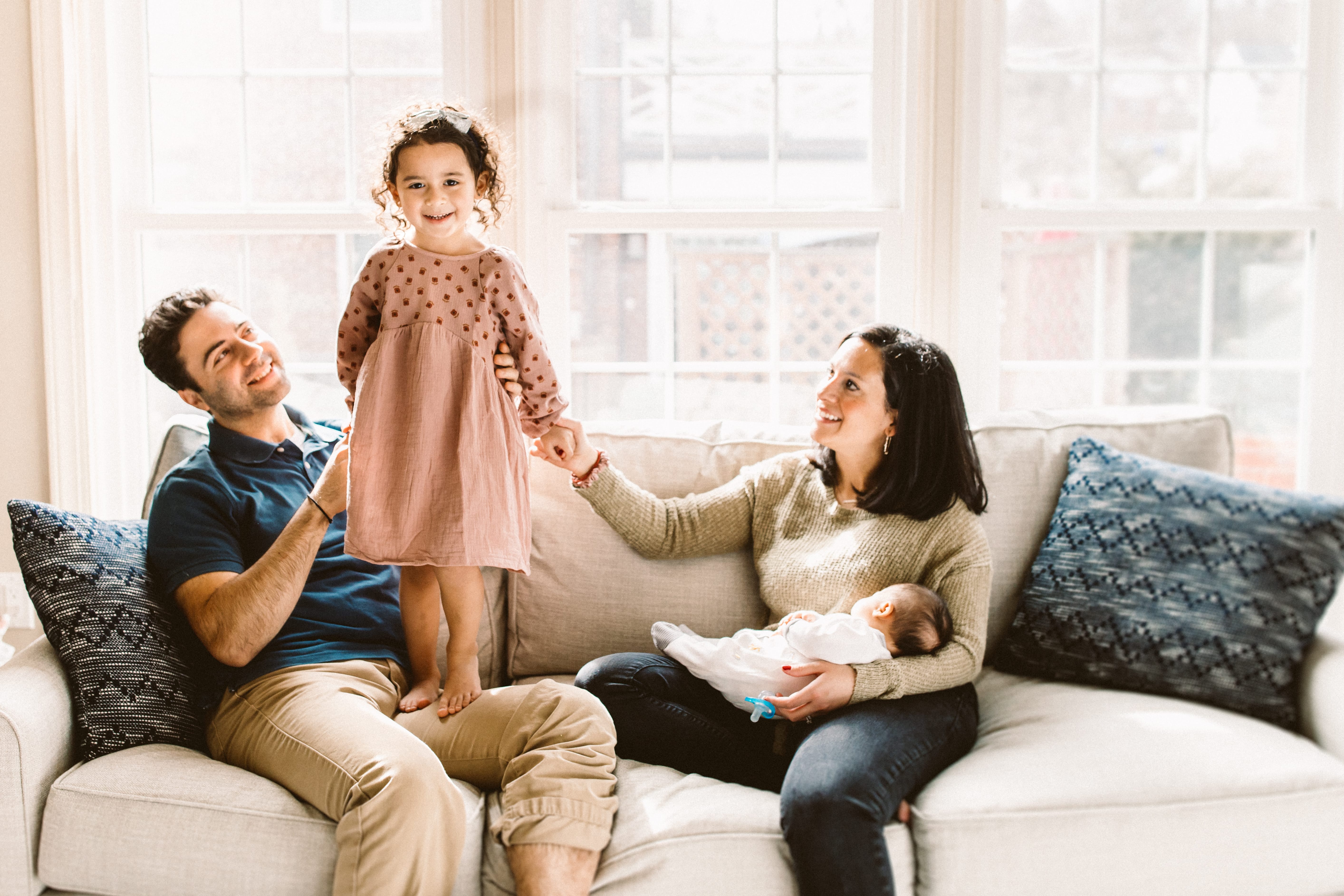 Family with young children photographed outdoors